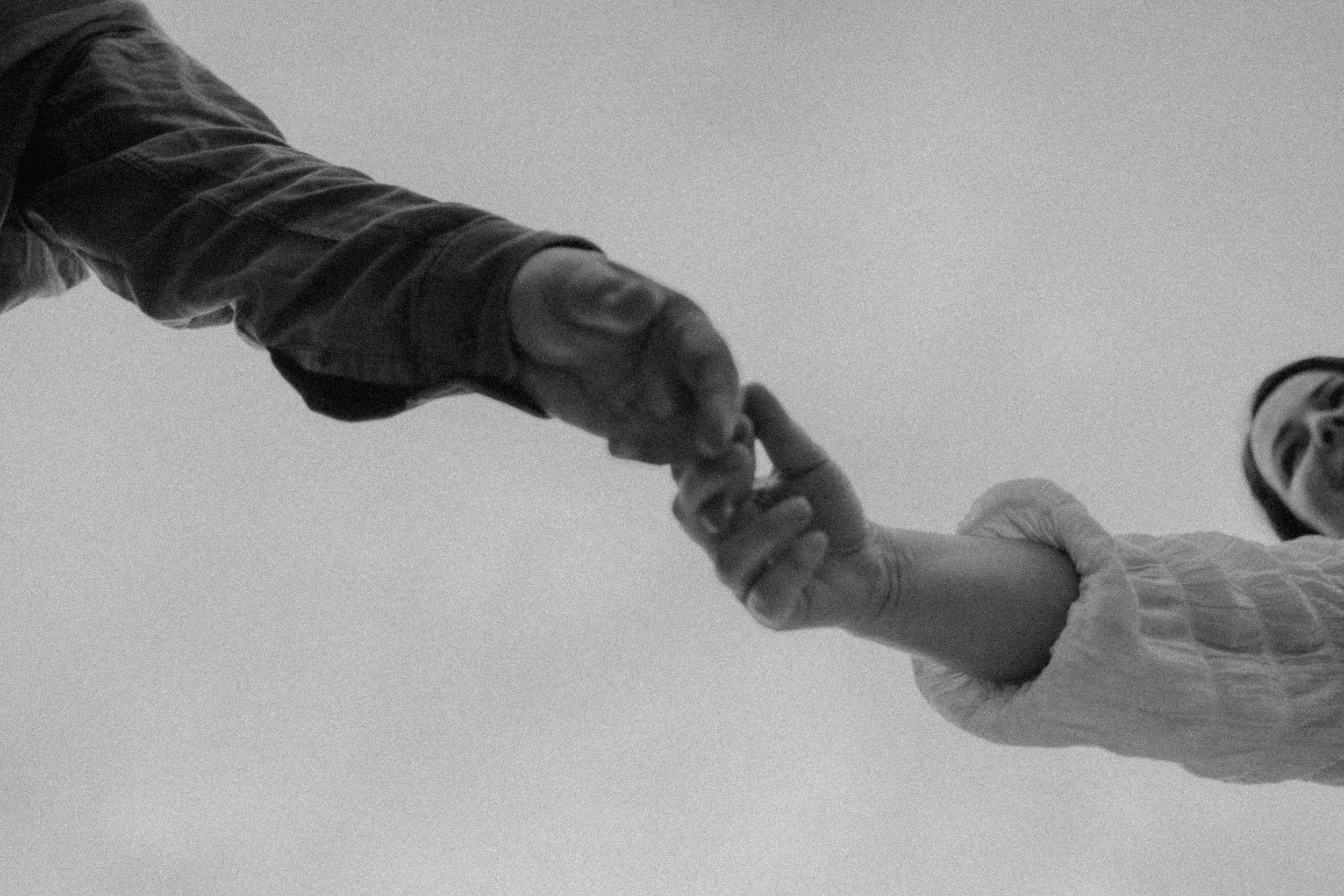 Hands touching in photo