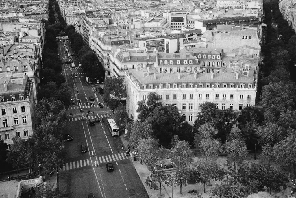 Black and white aerial view of Paris street and buildings at a Parisian elopement