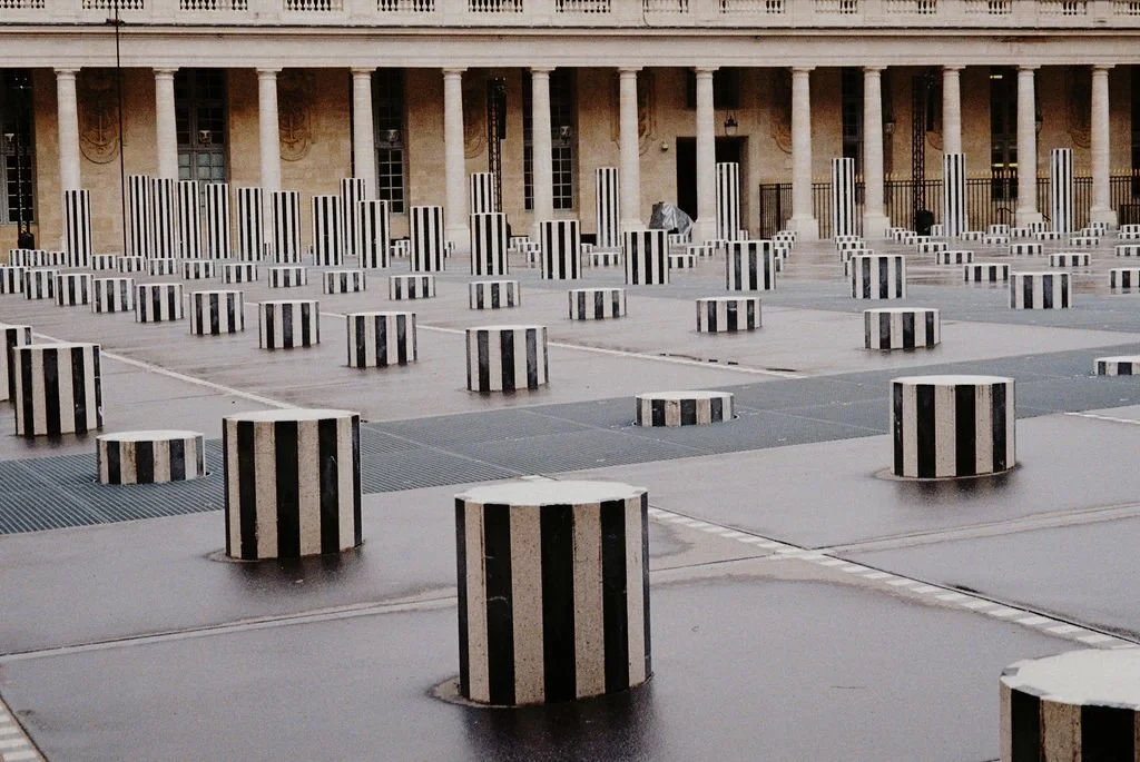 Black and white striped columns at Colonnes de Buren, Palais Royal, Paris.